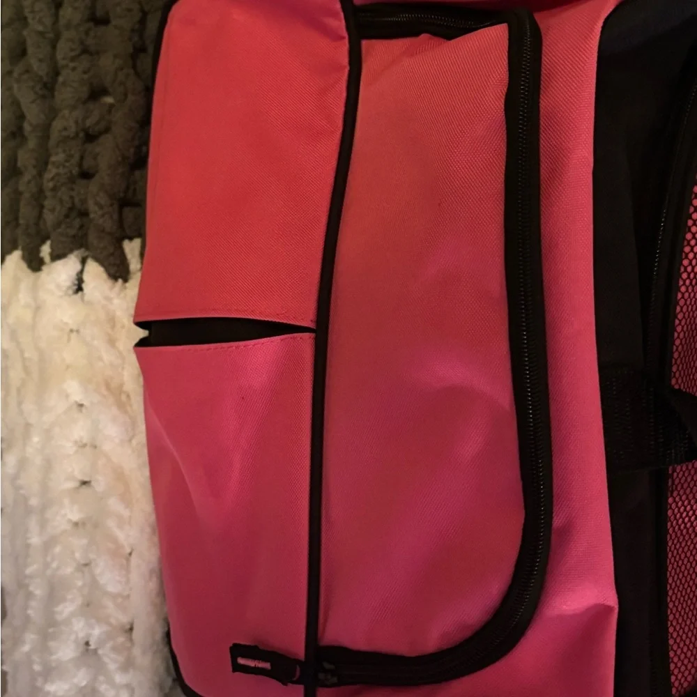 Pink and Black Garment Bag with Wheels 30” long• 16” wide• 14” high